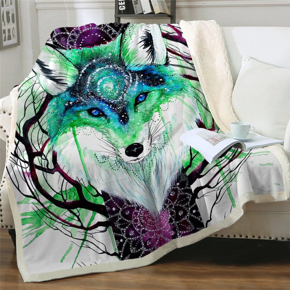 Couverture loup vert sur un canapé