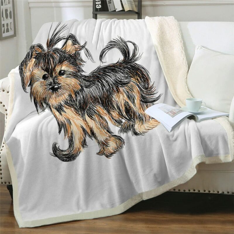 Plaid blanc motif chien sur un canapé