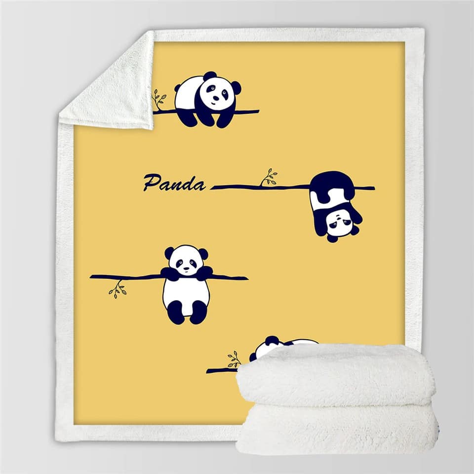Plaid jaune à bordures blanches, avec trois pandas qui gigotent sur des branches de bambou noires.