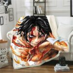 Plaid Luffy, univers One Piece sur un canapé blanc dans un salon