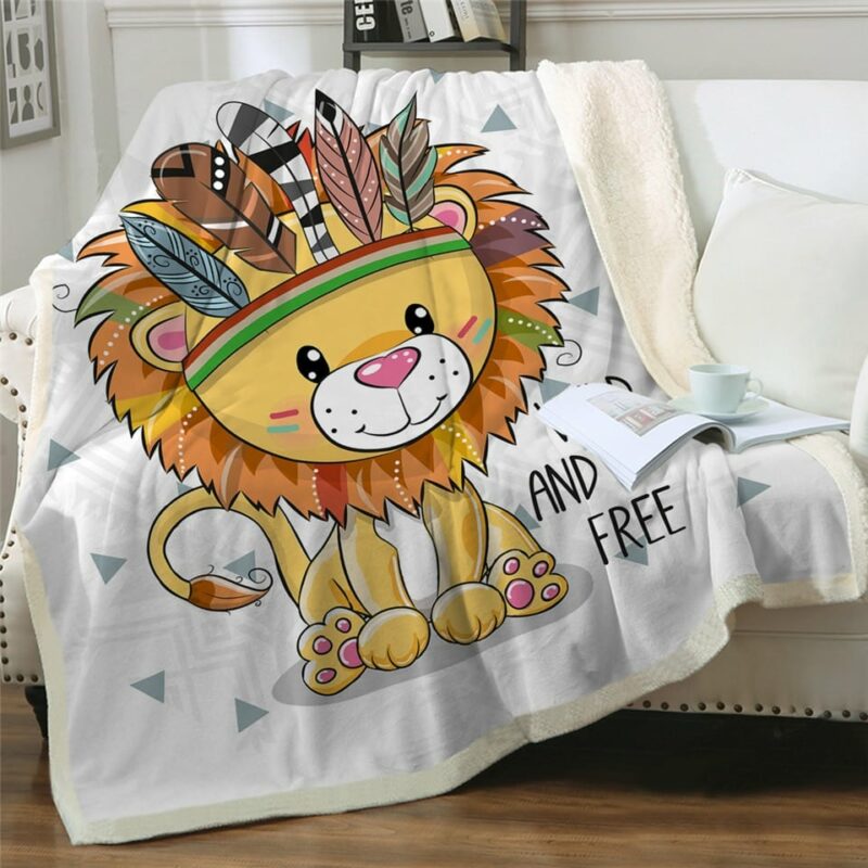 Plaid enfant avec lionceau coloré avec bandeau à plumes sur canapé blanc