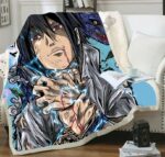 Plaid polaire motif Sasuke Ushiha sur un canapé