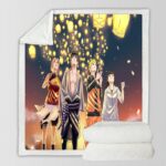 Plaid manga représentant Naruto, Hinata, Sasuke et Sakura regardant voler les lanternes volantes